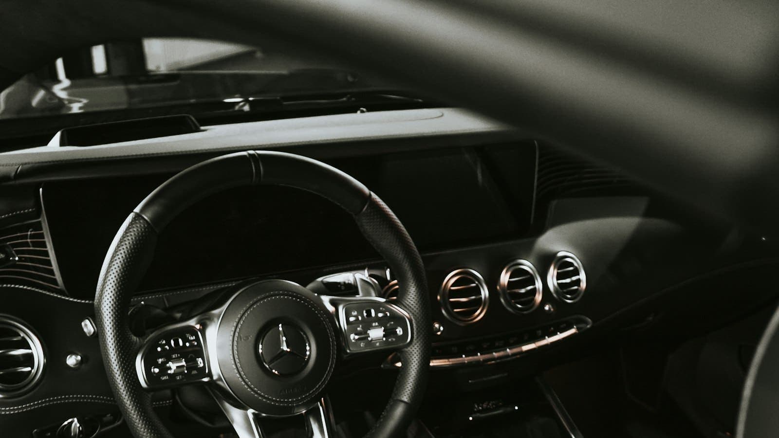 Mobile auto detailer at a customer's driveway with detailing equipment